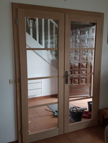 Double porte intérieure vitrée bois clair, entre deux pièces